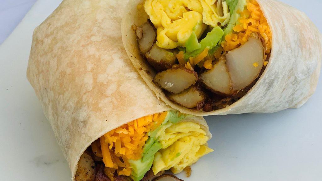 Vegetarian Breakfast Burrito · A massive unit of 2 scrambled eggs, melty cheddar, home fries, avocado and onion marmalade.