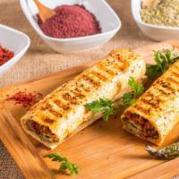 Kofte Kebab Sandwich · Seasoned ground beef with Turkish spices and herbs.