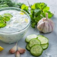 8 oz. Yogurt Salad · Cucumbers, yogurt, olive oil, and spices.