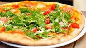 2. Go Green Pizza · Pesto sauce, spinach, garlic, basil, and fresh tomatoes.