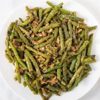 Dry Saute Green Beans · Fresh green beans tossed with ginger garlic and preserved Chinese turnips in house soy sauce.
