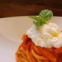 Spaghetti pomodoro e burrata (Veg) · Spaghettoni mancini, imported San Marzano D.O.P. tomato sauce, Italian burrata, basil, monoc...