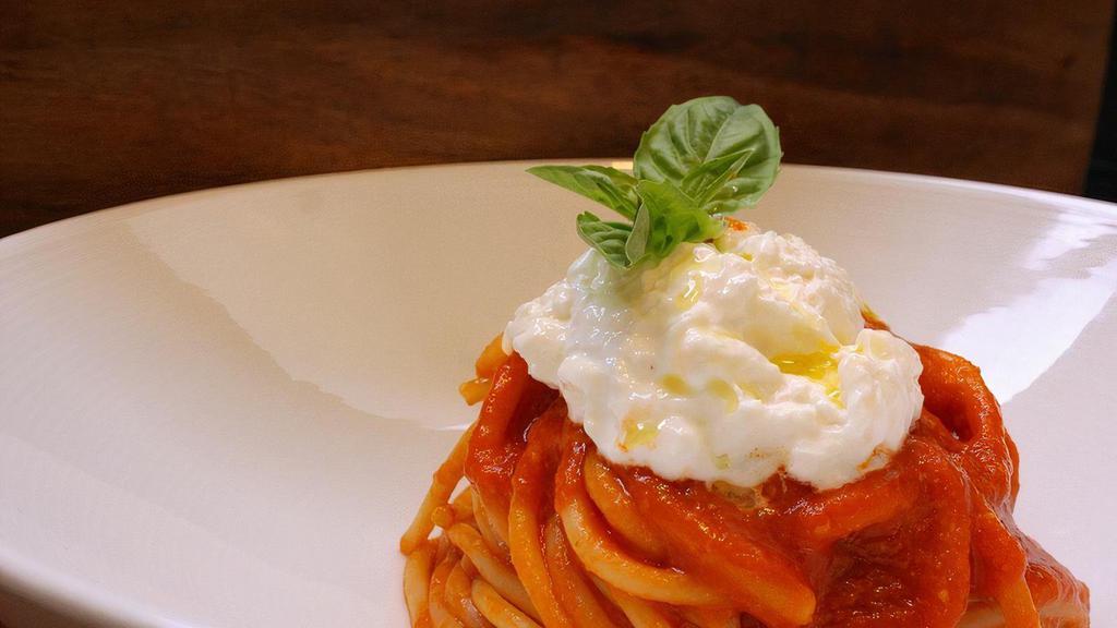 Spaghetti pomodoro e burrata (Veg) · Spaghettoni mancini, imported San Marzano D.O.P. tomato sauce, Italian burrata, basil, monocultivar Taggiasca extra virgin olive oil
