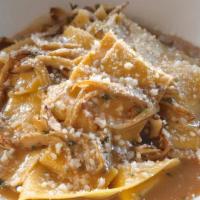 Pappardelle · Long wide pasta, organic hen of woods mushrooms, beef reduction. parsley, grana padano