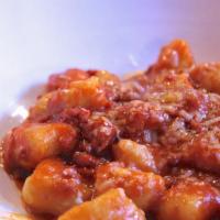 Gnocchi Alla Bolognese · Potato gnocchi, traditional bolognese sauce, Parmigiano Reggiano
