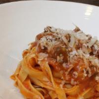 Tagliatelle al cinghiale · Long narrow pasta, grappa/sangiovese marinated wild boar sugo, pecorino toscano, black pepper