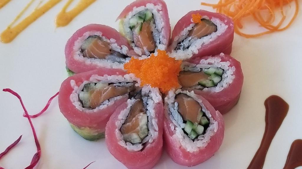 Cherry Blossom Roll · Out: tuna, avocado, & masago. In:  salmon & cucumber.