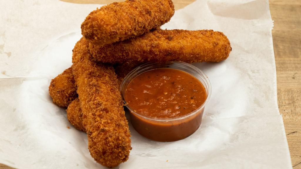 Fried Mozzarella · *CAN NOT BE MADE GLUTEN FREE* Hand-crusted cashew mozzarella served with a side of marinara.