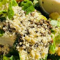 Caesar · Chopped little gems lettuce w/ creamy caesar dressing, fried capers, parmesan & croutons.