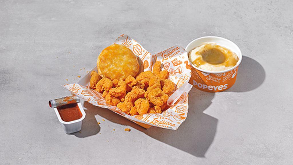 ¼ Pound Popcorn Shrimp Dinner* · Includes a choice of regular signature side, a biscuit. *Weight based on pre-cooked shrimp weight.