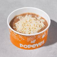 Red Beans & Rice · A famous Popeyes favorite. Tasty, velvety-smooth red beans served with seasoned rice.