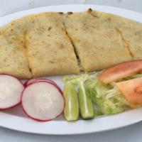 Quesadilla · Large Handmade folded tortilla, meat, limes, grilled onion.