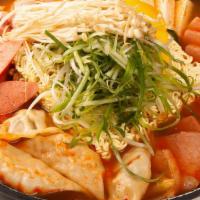 44. Budae Stew · Spam, sausage, cheese, vegetables, noodle, potsticker, tofu and ricecake.
Serves 2