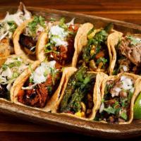 10 Tacos · Choose from our taco selections including meaty and veggie options. Comes with three signatu...