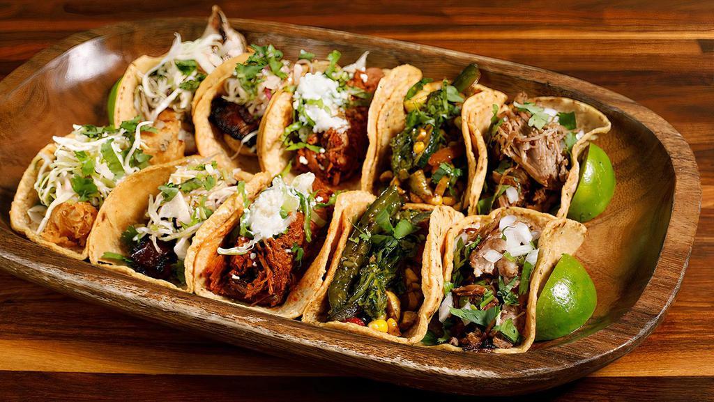 10 Tacos · Choose from our taco selections including meaty and veggie options. Comes with three signature salsas.