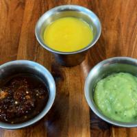 Salsa Trio · Includes avocado-tomatillo, smoky chipotle, and spicy habanero salsas