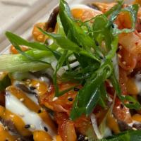 Fire Fries · Bulgogi beef, kimchi, shredded cheese, garlic aioli, house Korean chili sauce, sesame, green...