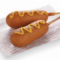 Corn Dogs · Made from turkey, pork, and chicken and then dunked in our secret batter, these are more tha...