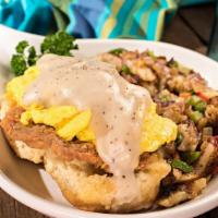 Tom'S Scramble · A scratch-made buttermilk biscuit topped with your choice of a sausage patty or a chicken fr...