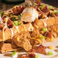 Stacked Chicken & Waffles · A sweet and savory taste explosion!  Two tender, hand-breaded chicken breasts between our bu...
