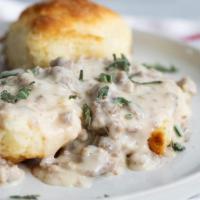 Biscuits & Gravy · Our scratch-made buttermilk biscuit topped with Huck's country gravy.  Your choice of 2 baco...
