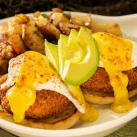 Crab Cake Benedict · Two poached eggs over our tender crab cakes on an English muffin topped with fresh avocado.