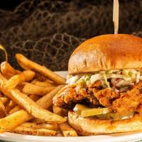 Spicy Bayou Chicken · A hand-breaded breast, fried crisp & tossed in Frank's Hot Sauce stacked high with crisp sla...