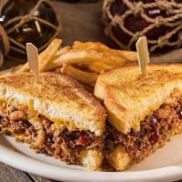 Dixieland Steak Melt · Thinly sliced sirloin drizzled with Huck's BBQ sauce on grilled sourdough topped with Onion ...