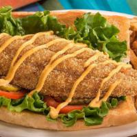 Catfish Po-Boy · Crispy catfish on a toasted sourdough roll with leaf lettuce, ripe tomatoes, pickles and Sri...
