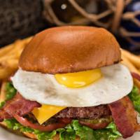 Bubba'S · A big, two-fisted burger loaded with all the good stuff- smokey bacon, aged cheddar cheese a...