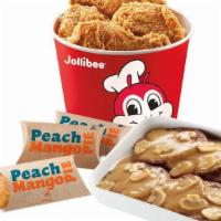 Chickenjoy Bucket Treat A · 6 Pc Chickenjoy Bucket served with gravy for dipping, Burger Steak Family Pack and 3 Pies