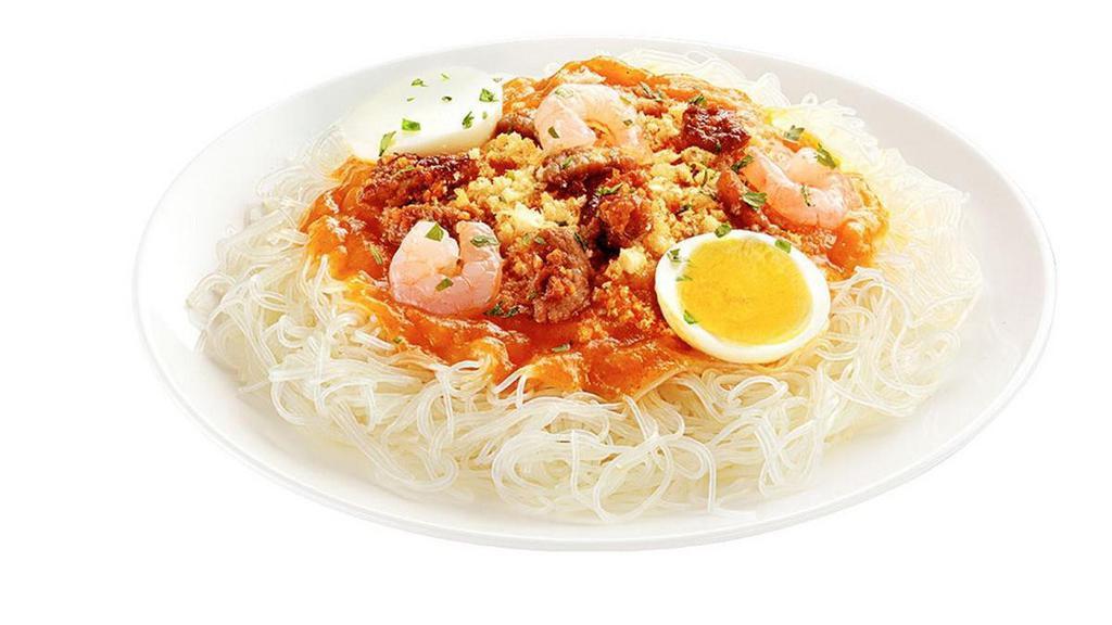 Palabok Fiesta · A traditional Filipino noodle dish covered in garlic sauce, sauteed pork, shrimp, and egg. Note: Palabok sauce contains shrimp and pork that cannot be removed