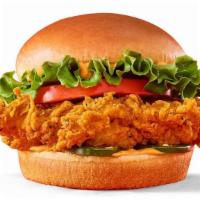 Spicy Deluxe Chicken Sandwich · Our Spicy Chickenwich starts with a crispy juicy hand-breaded chicken breast fillet, spread ...
