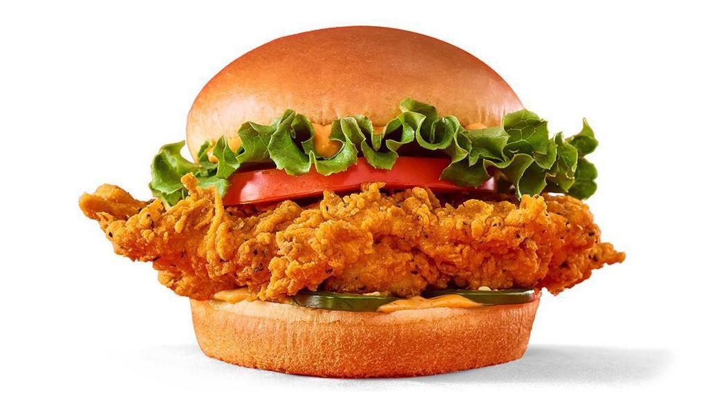 Spicy Deluxe Chicken Sandwich · Our Spicy Chickenwich starts with a crispy juicy hand-breaded chicken breast fillet, spread with sriracha mayo, topped with fresh sliced tomato and crisp lettuce, and served with fresh jalapenos on a toasted brioche bun