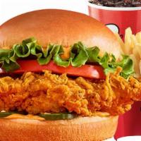 Spicy Deluxe Chicken Sandwich W/ 1 Side & Drink** · Our Spicy Chickenwich starts with a crispy juicy hand-breaded chicken breast fillet, spread ...