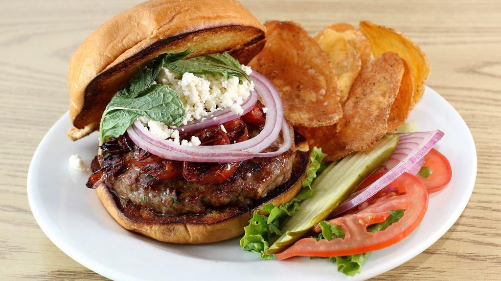 Lamb Burger · Herbed Lamb Patty Served with Whipped Feta, Caramelized Tomatoes and Pimento Aioli on Ciabatta Bun with Condiments