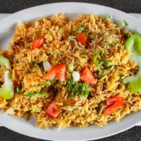 72. Chicken Biryani · Steamed Indian basmati rice with spiced chicken.