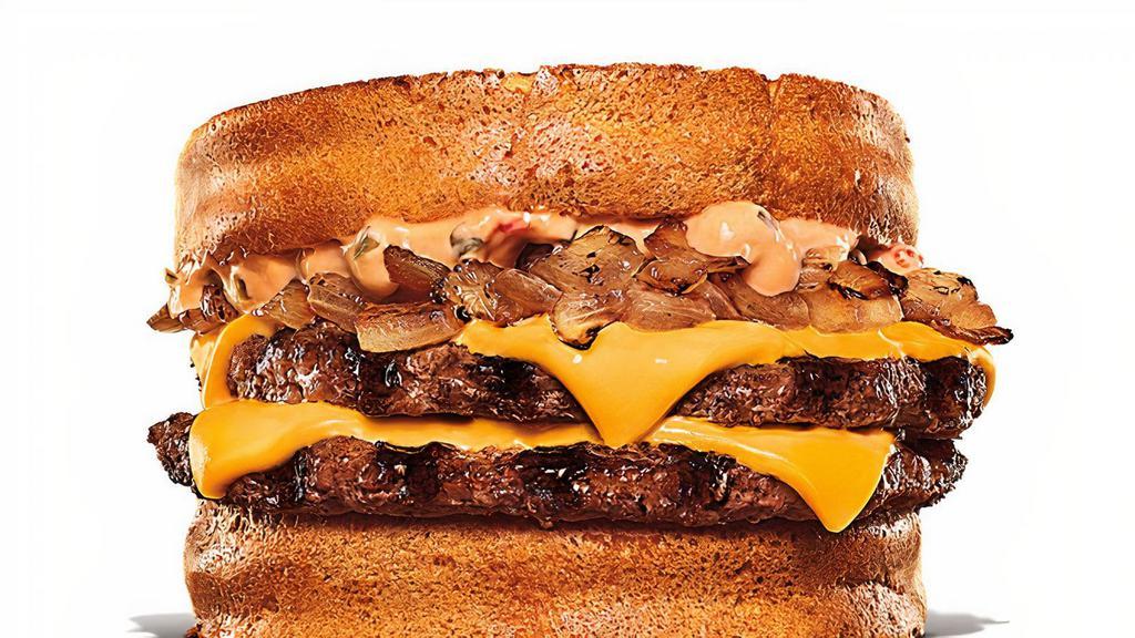 Whopper Melt · New Whopper Melt features two slices of toast, layered with ¼. lb of flame-grilled beef, melty American cheese, caramelized onions and sauce.