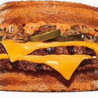 Spicy Whopper Melt · New Spicy Whopper Melt features two slices of toast, layered with ¼. lb of flame-grilled bee...