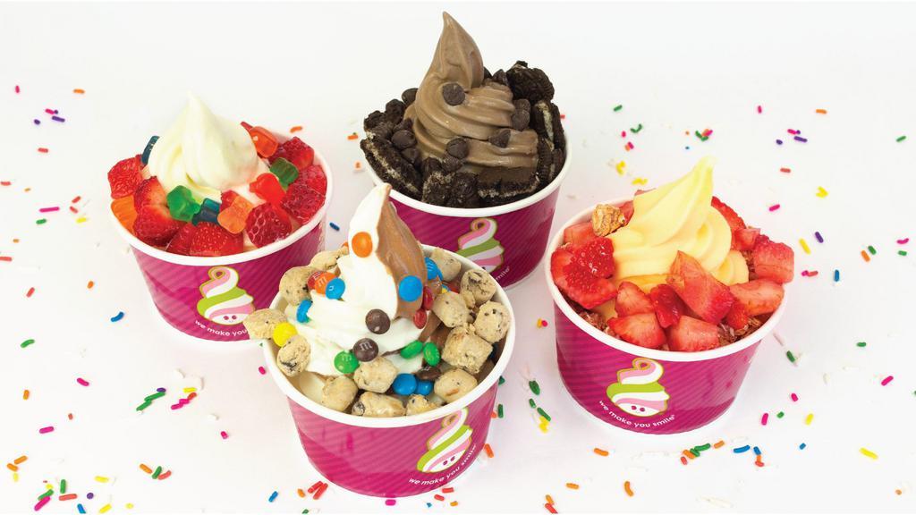 4 Small Frozen Yogurt Cups + 1 Topping per cup · Family Pack with 4 small frozen yogurt cups + 1 Topping per cup of your choice