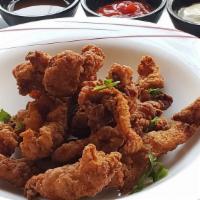 Crispy Chicken Pokoda · spiced chicken fritters,sweet chilly and plum flavor  sauce