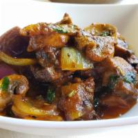 Mushroom Masala · Mushroom cooked in a special blend of spices.