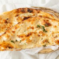 Garlic Naan · Leavened bread topped with garlic and chives.