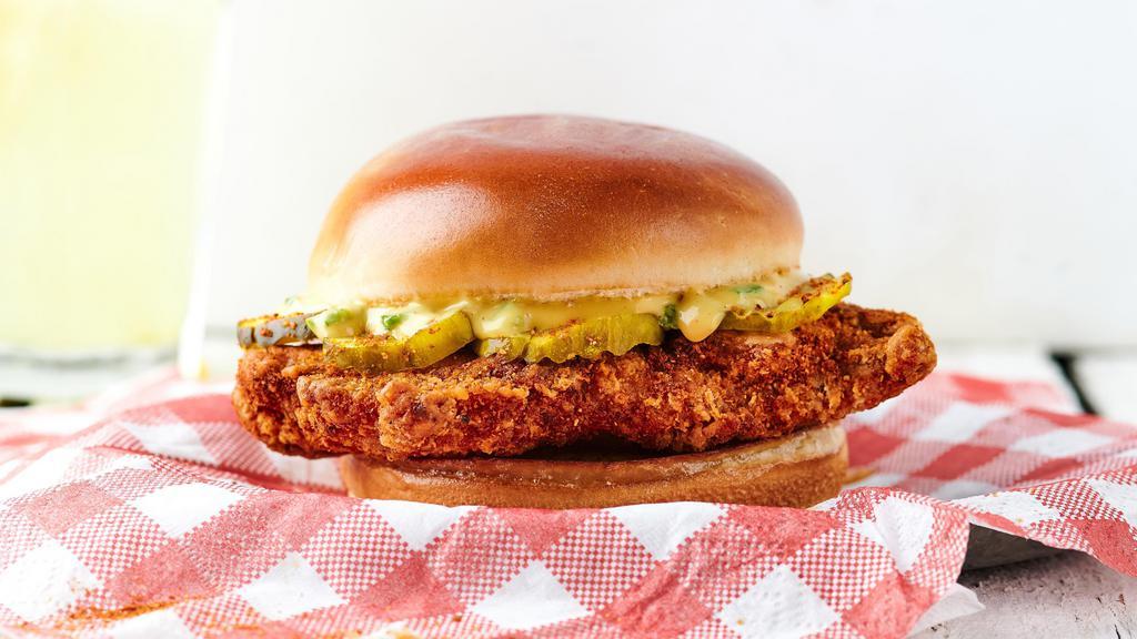 The Spicy Chick · Spicy fried chicken, jalapeño honey mustard, topped with bread & butter pickles