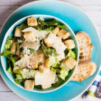 The Caesar Salad · Fresh salad made with crispy Romaine lettuce tossed with croutons, grated cheese and a Caesa...