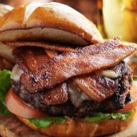 Bacon Cheeseburger · Mouthwatering burger topped with melted cheese, bacon, lettuce, pickles, onions, tomatoes, a...