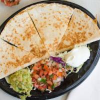 Classic Quesadilla · 850-964 calories. Large grilled flour tortilla filled with Jack and Cheddar cheeses. Served ...
