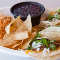 Mexico City Tacos · 1040-1060 calories. Three tacos, chicken, carne asada or carnitas in any combination. Includ...