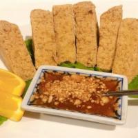 Golden Tofu · Served with ground peanuts in plum dipping sauce.
