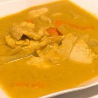 Yellow Curry · Yellow coconut curry with potatoes, carrots, and onions with chicken, beef, pork, tofu, or m...